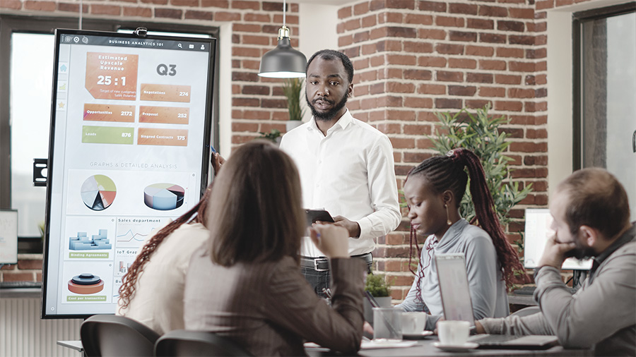 HR professionals reviewing financial information