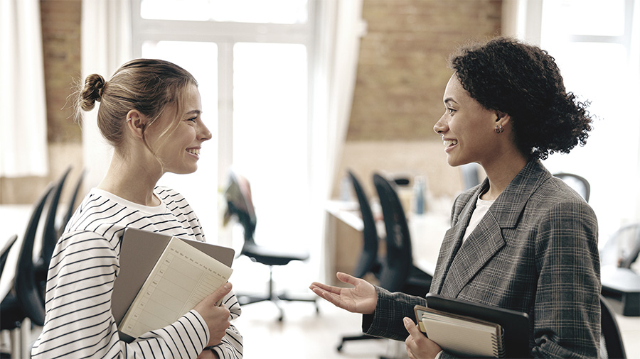 Employees collaborating in a supportive workplace