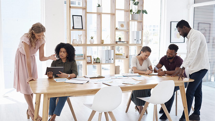 Payroll specialists improving operational efficiency