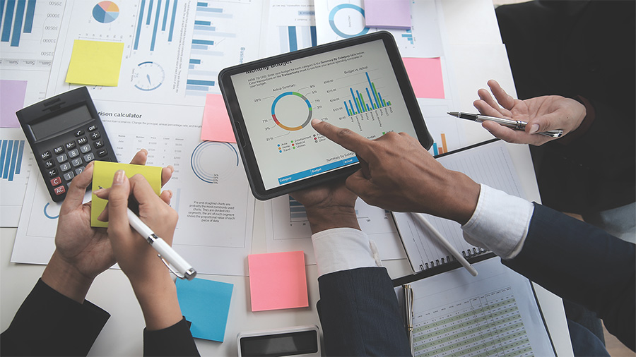 Payroll professionals managing business costs